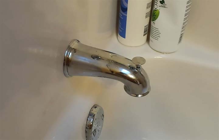 how high above tub should faucet be